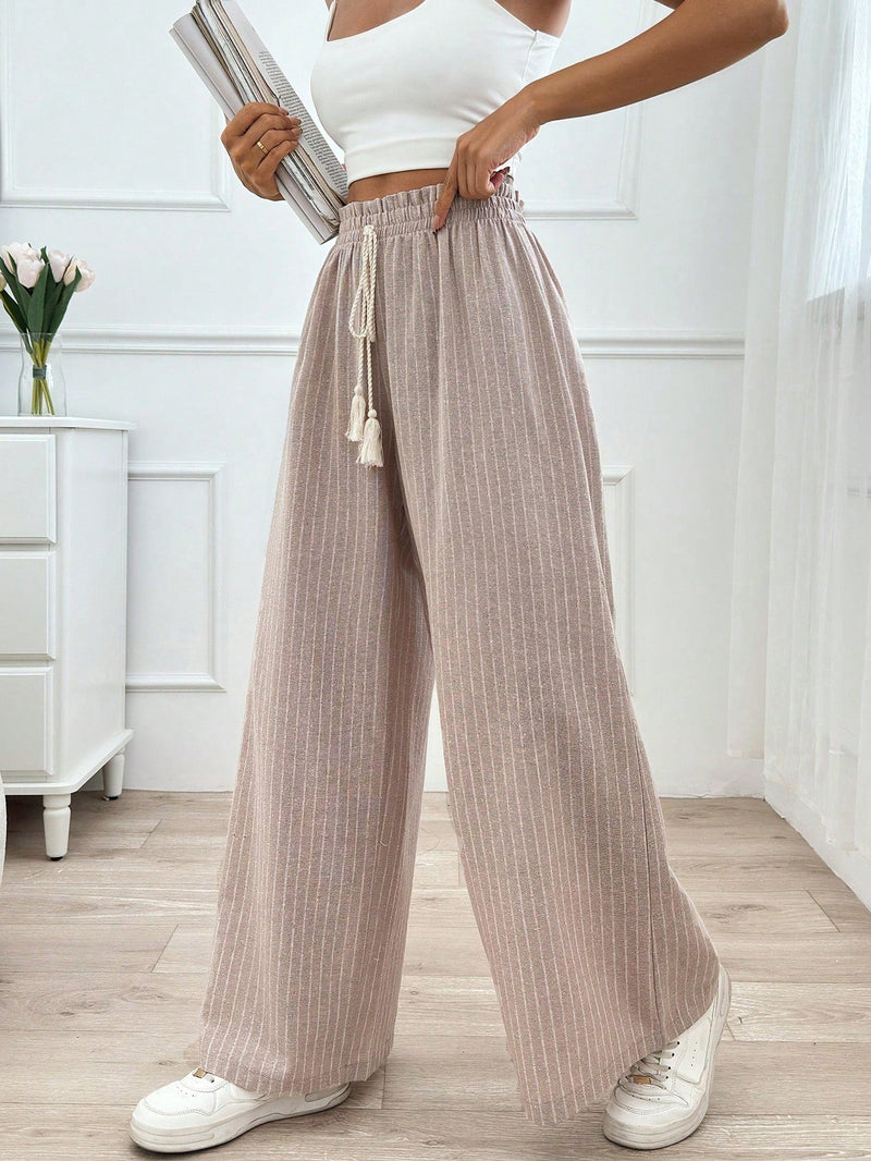 Pantalones boho anchos de vacaciones con bandas elasticas tejidas de rayas y cordon decorativo