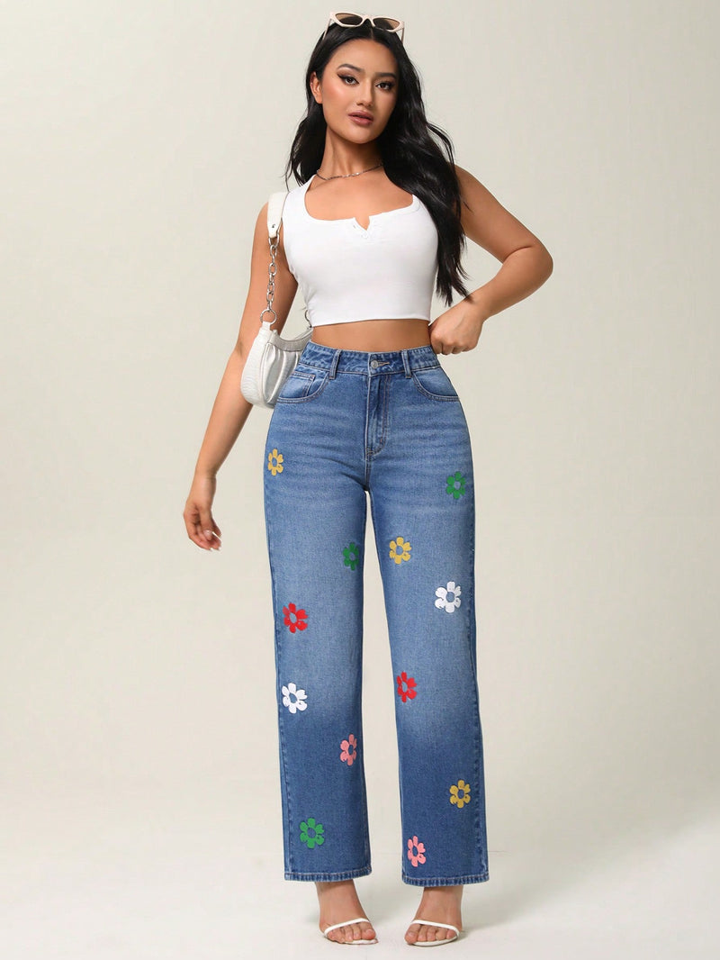 Essnce Jeans informales de mezclilla con estampado floral lavado en agua y pierna recta