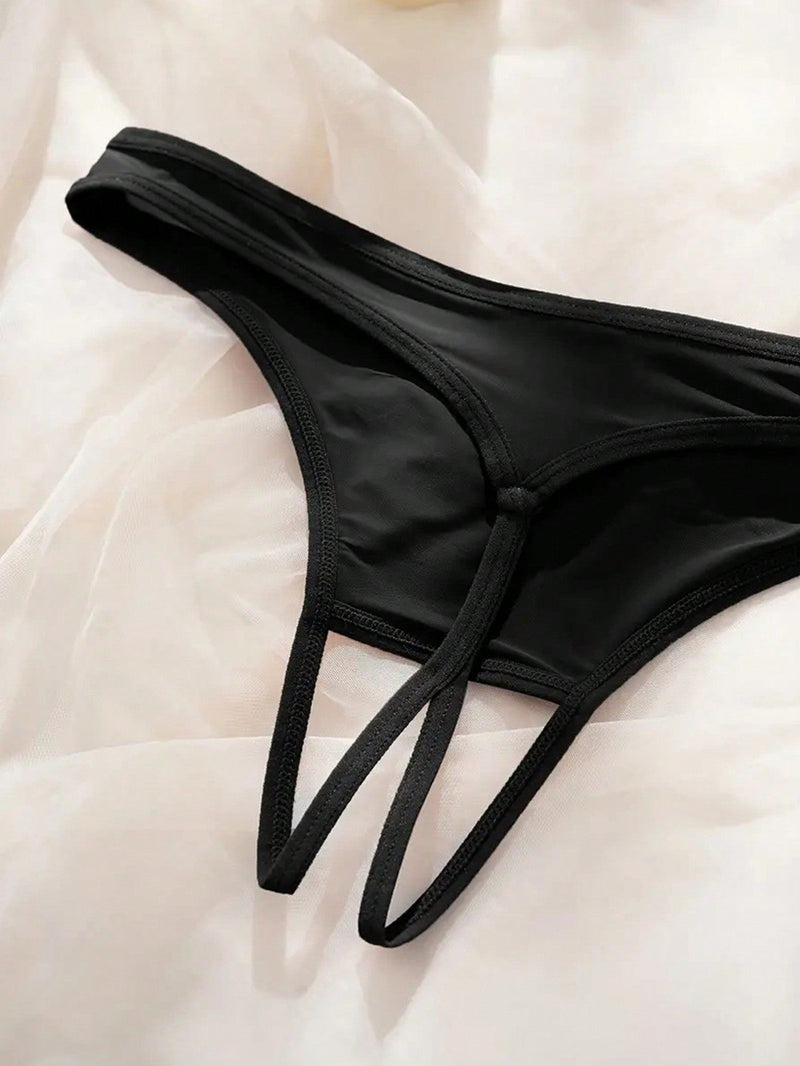 Ropa interior de tanga sexy para mujeres con diseno impreso, entrepierna abierta y tela delgada