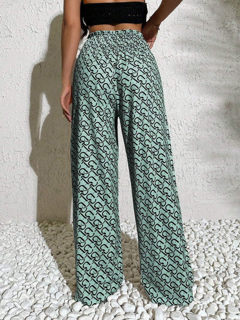 Pantalones anchos boho casuales elegantes con tejido de punto estampado, textura ahumada en la cintura con cordon decorado