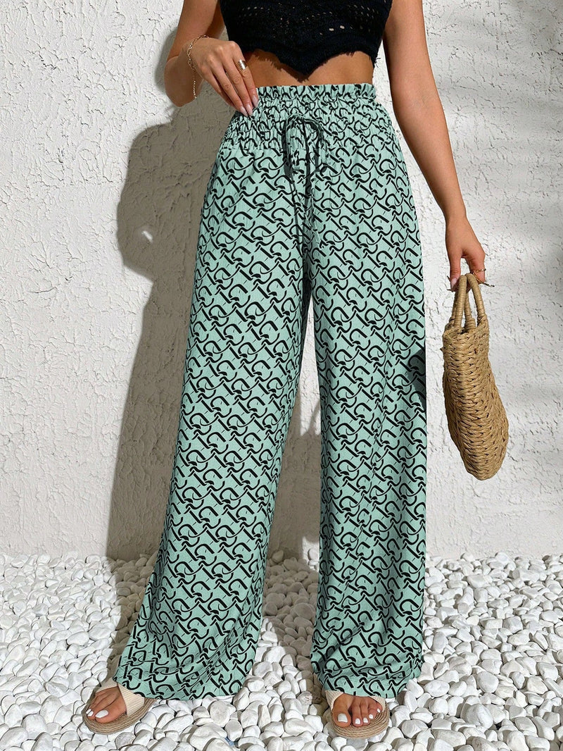 Pantalones anchos casuales y elegantes de estilo bohemio con tejido decorado de punto con diseno impreso en todo el pantalon, cintura fruncida y detalle de cordon