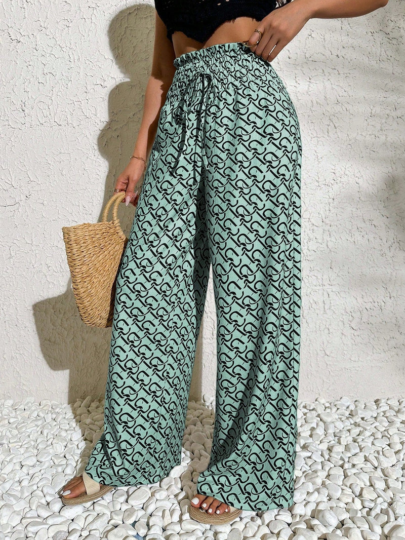 Pantalones anchos casuales y elegantes de estilo bohemio con tejido decorado de punto con diseno impreso en todo el pantalon, cintura fruncida y detalle de cordon