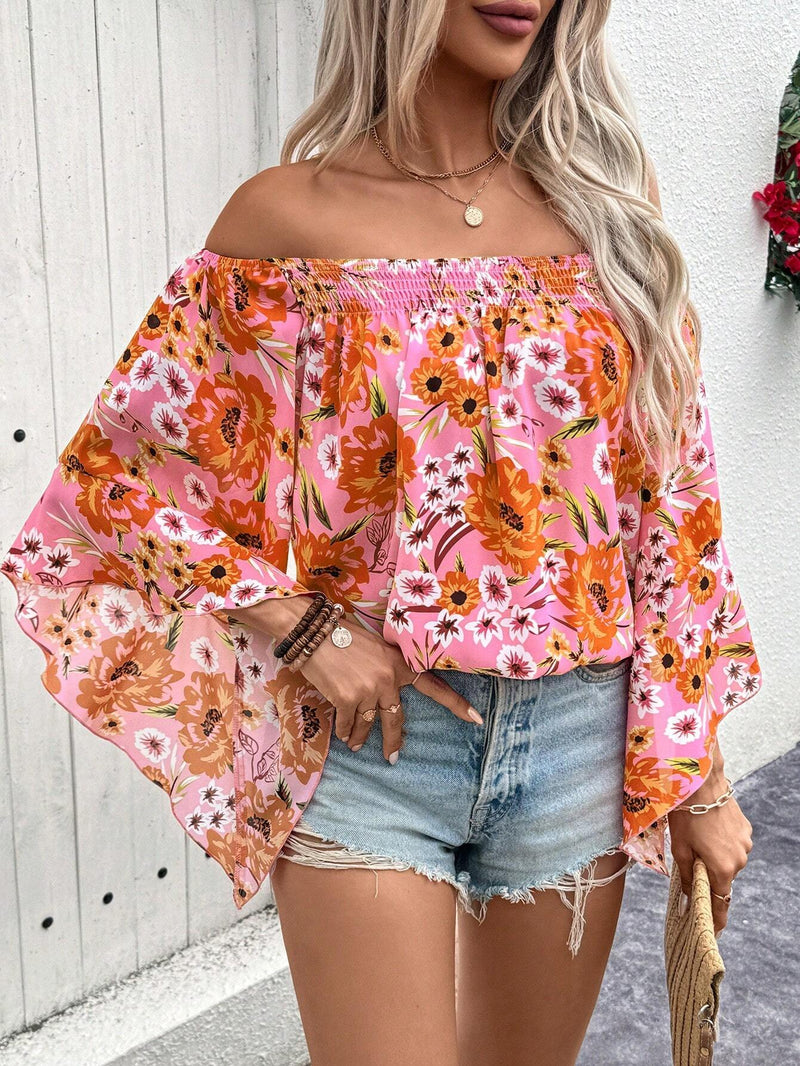 Blusa elegante y de moda para mujer con estampado floral, corte holgado, hombros descubiertos y mangas acampanadas para las vacaciones