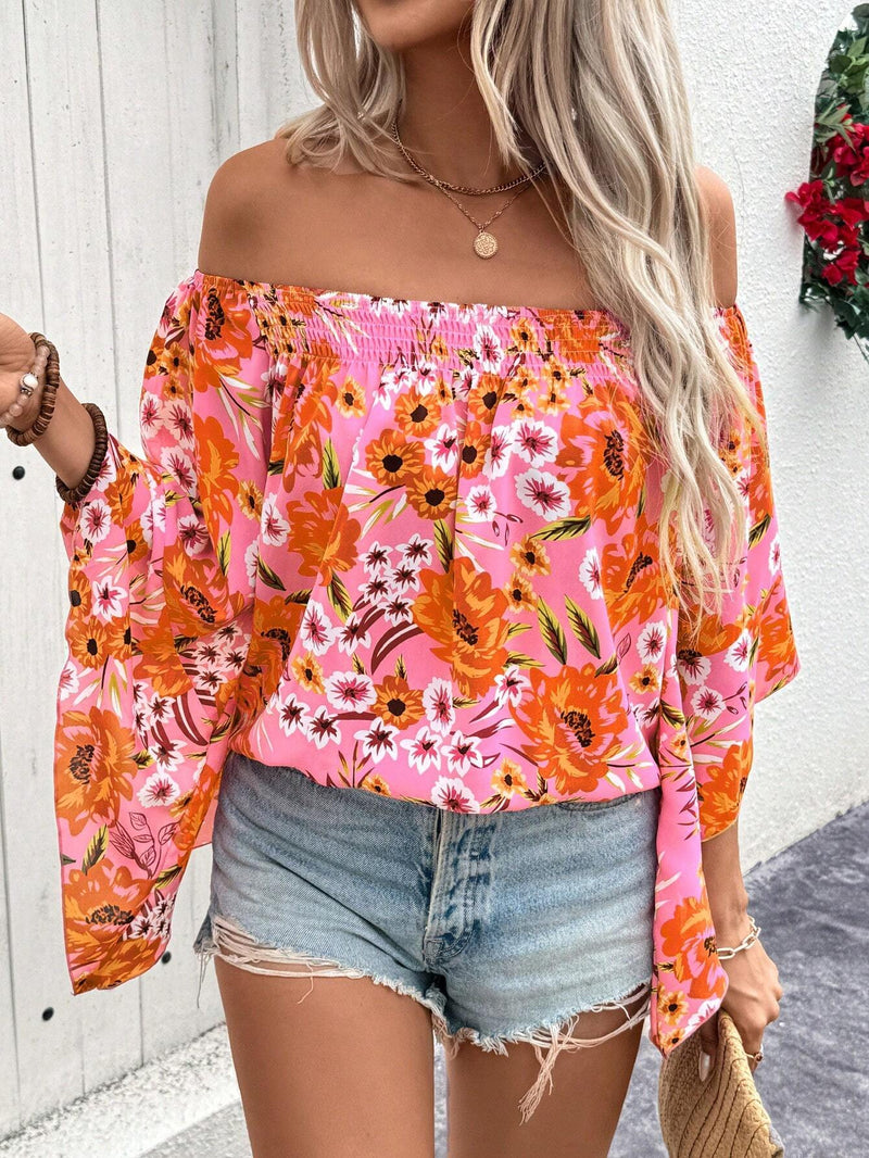 Blusa elegante y de moda para mujer con estampado floral, corte holgado, hombros descubiertos y mangas acampanadas para las vacaciones