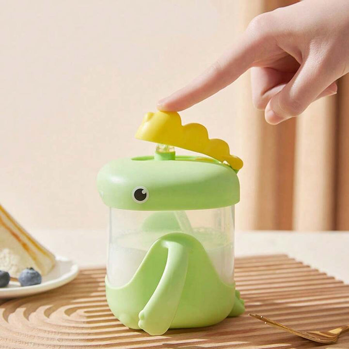 VASO ENTRENADOR PARA BEBÉ CON DISEÑO DE DINOSAURIO 300ML 35157-9 MUNBE