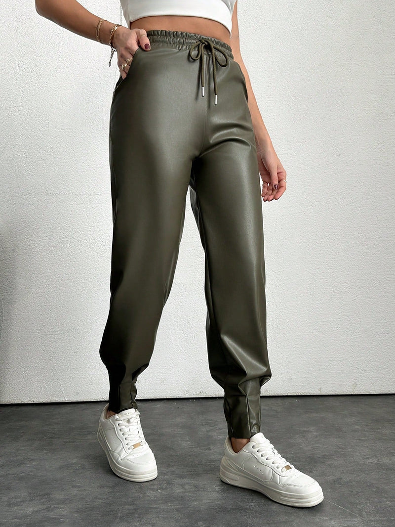 Pantalones con punos elasticos y cintura con cordon de color liso para mujer