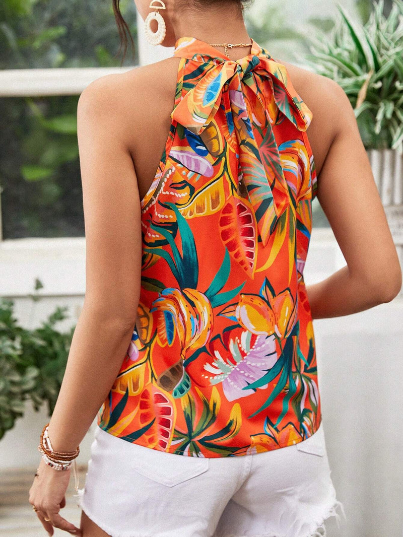 Parte superior de mujer con diseno floral, cuello halter y espalda descubierta para verano en la playa