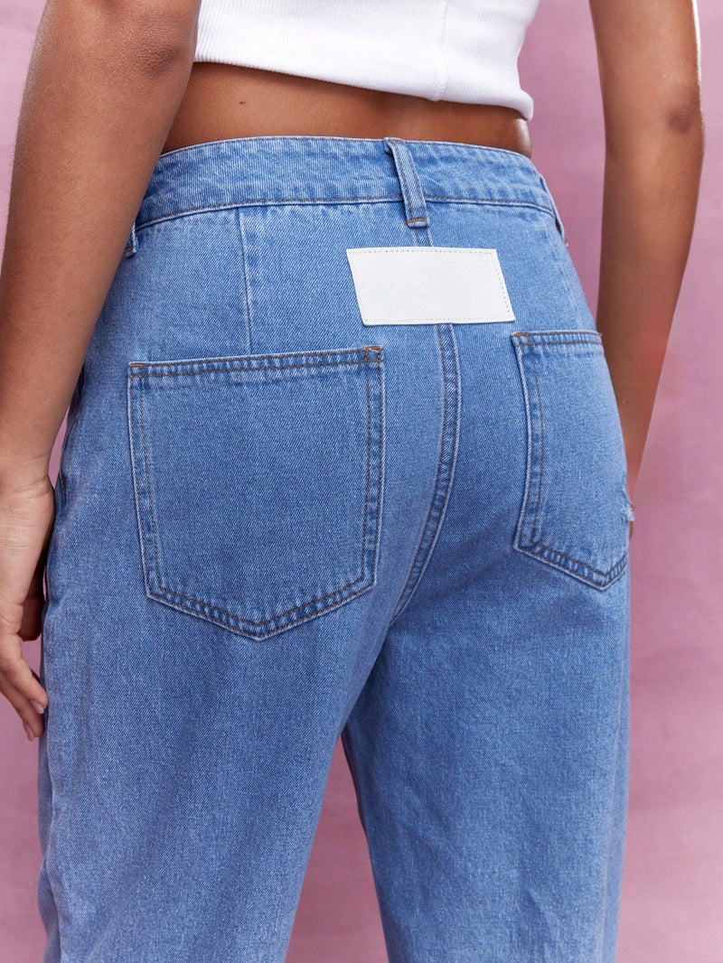 MISSGUIDED Jeans ajustados con diseno de cintura asimetrica y dobladillo desgastado