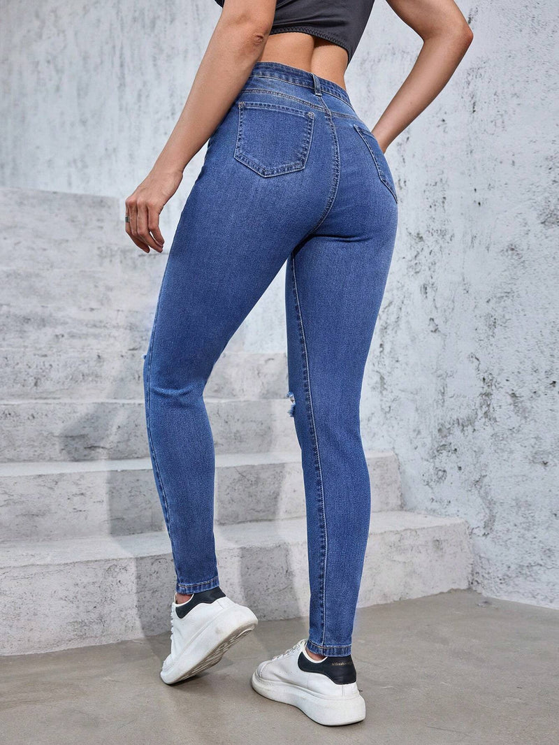 Jeans rotos lavados de ajuste delgado casuales para mujer