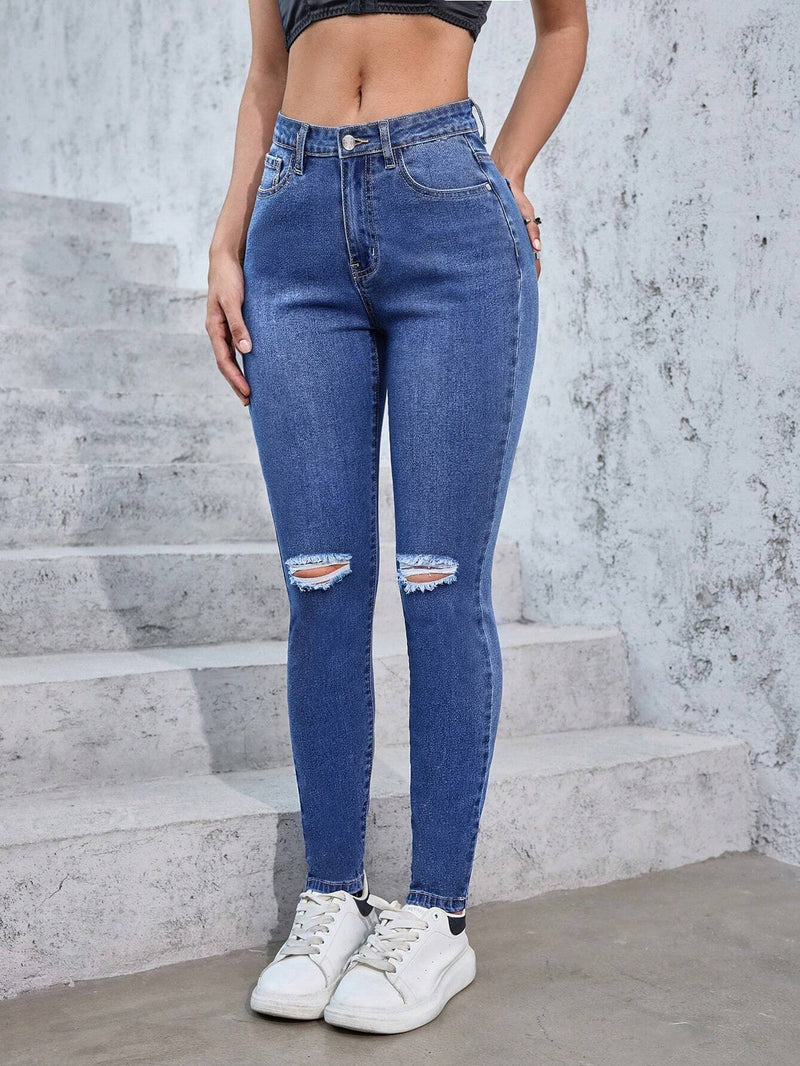 Jeans rotos lavados de ajuste delgado casuales para mujer