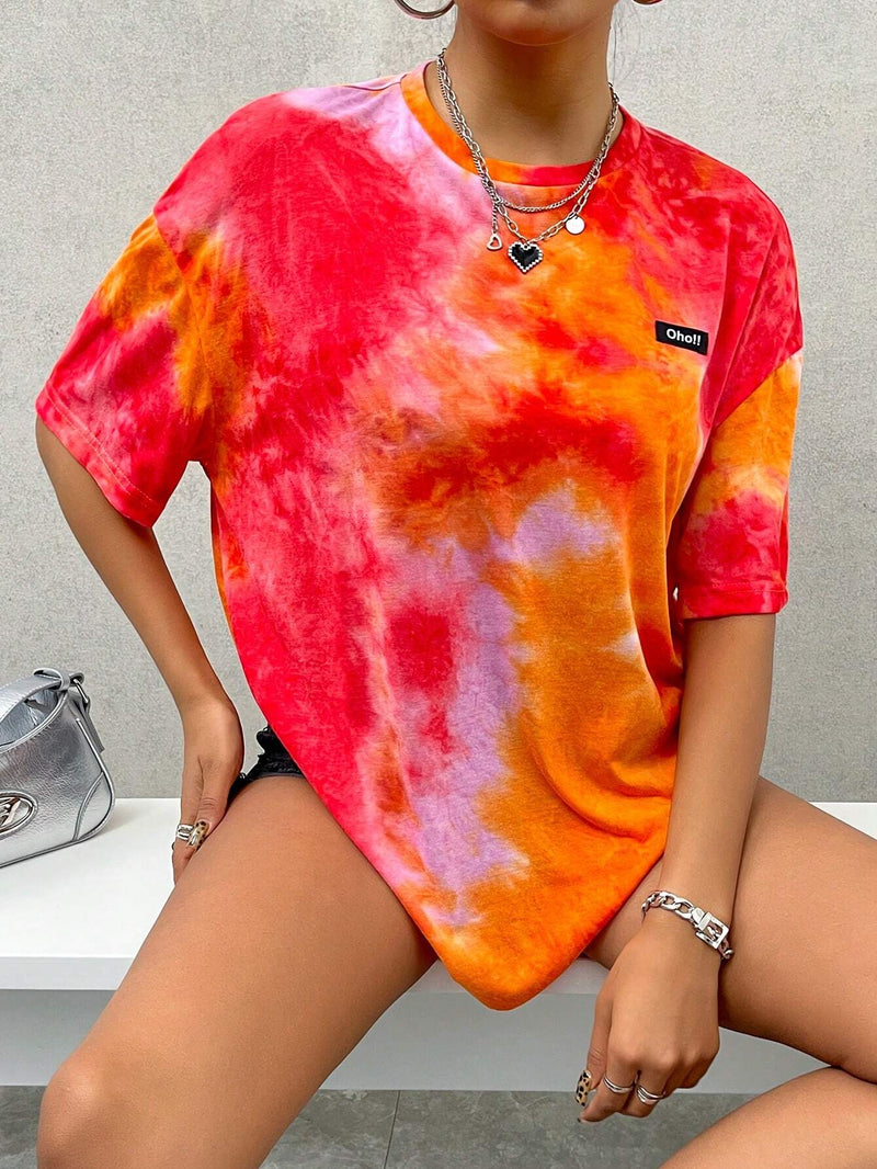 Camiseta casual de verano holgada para mujeres con cuello redondo, mangas caidas, patron de alfabeto y estampado de tie-dye