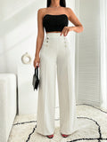 Pantalon palazzo de pierna ancha blanco con detalle de botones