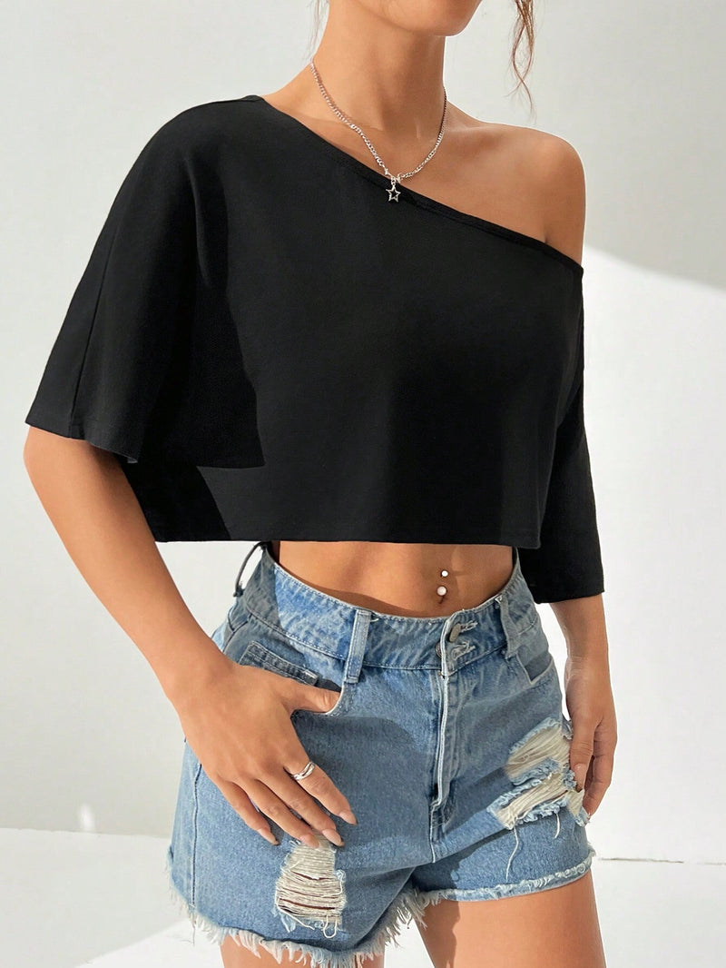 Top corto casual de mujer con cuello asimetrico y unicolor para el verano