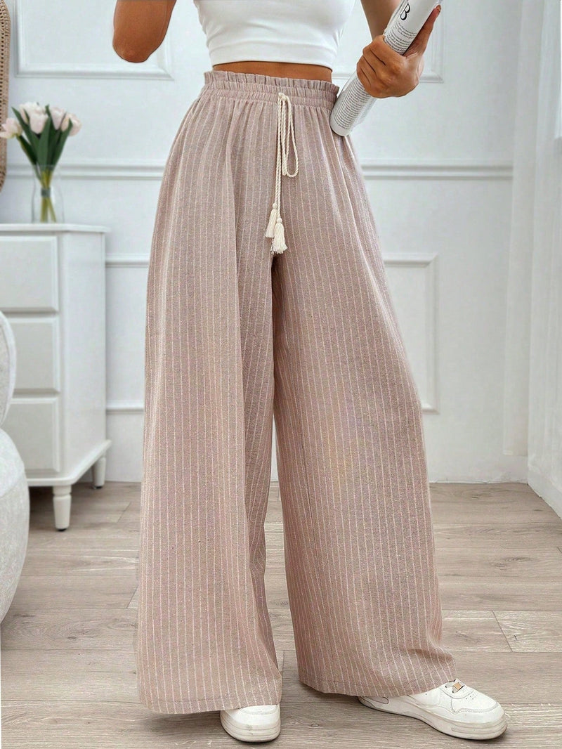 Pantalones boho anchos de vacaciones con bandas elasticas tejidas de rayas y cordon decorativo