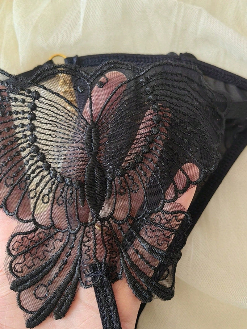 Tanga sexy con cadena caliente y con dibujos de mariposas transparentes para mujeres, ropa interior de cintura baja