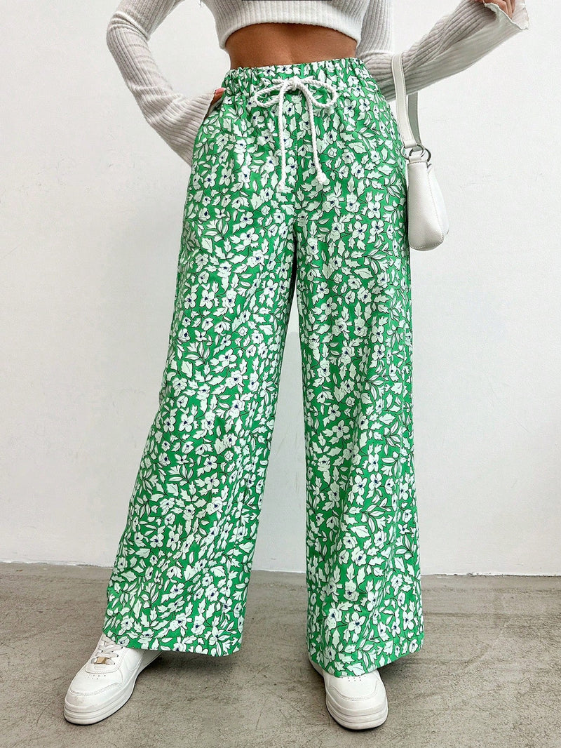 Pantalones largos con cintura con cordon y estampado floral