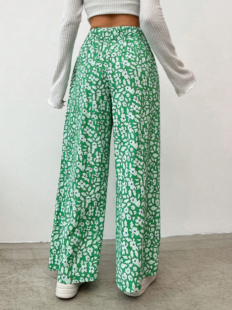 Pantalones largos con cintura con cordon y estampado floral