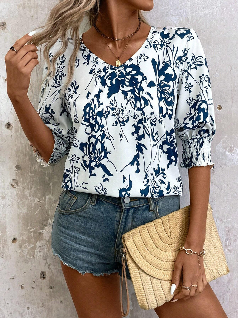 Camisa de media manga suelta con cuello en V y estampado floral para mujer para vacaciones de verano