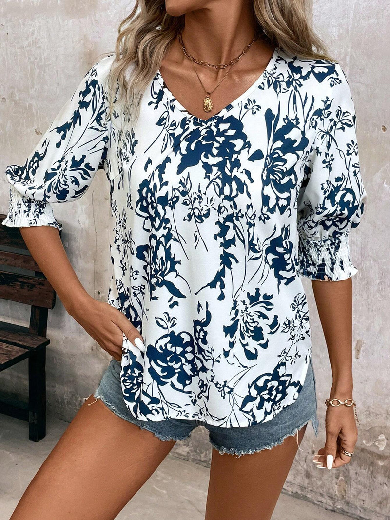 Camisa de media manga suelta con cuello en V y estampado floral para mujer para vacaciones de verano