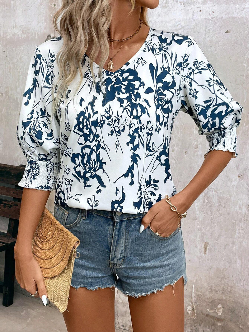 Camisa de media manga suelta con cuello en V y estampado floral para mujer para vacaciones de verano