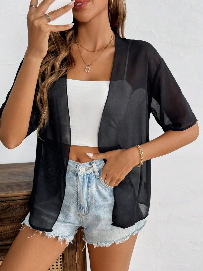 Cardigan casual de manga corta y tela transparente para mujer en el verano