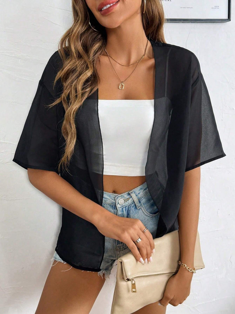 Cardigan casual de manga corta y tela transparente para mujer en el verano