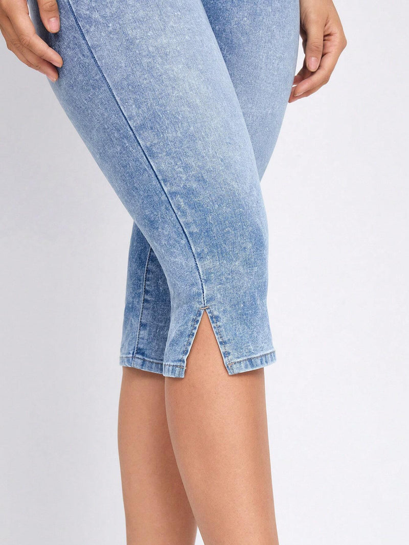 Jeans ajustados con cintura alta y dobladillo dividido