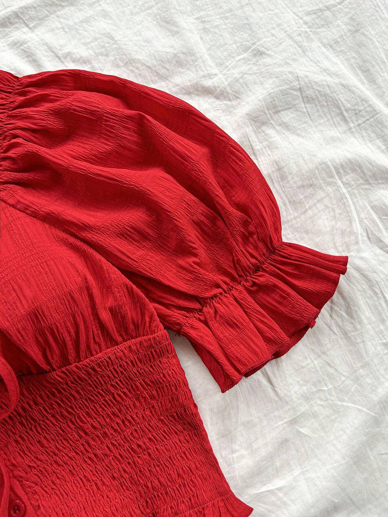 Blusa de mujer roja a cuadros texturizada con mangas abullonadas, lazo en el pecho, cintura elastica y dobladillo con volantes, camisa romantica informal para vacaciones