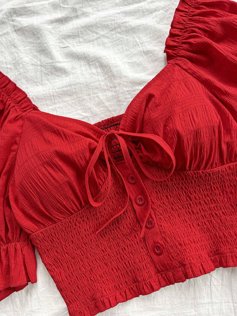 Blusa de mujer roja a cuadros texturizada con mangas abullonadas, lazo en el pecho, cintura elastica y dobladillo con volantes, camisa romantica informal para vacaciones