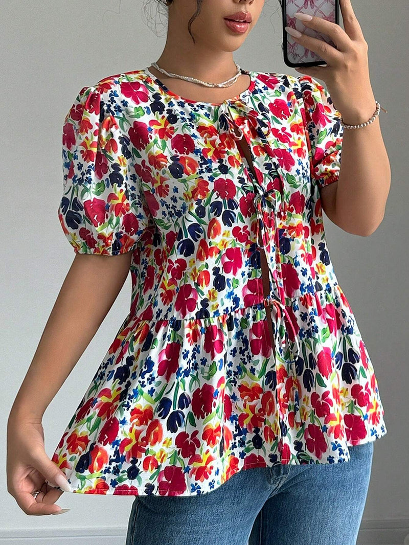 Blusa de manga abullonada con estampado floral y cuello de lazo