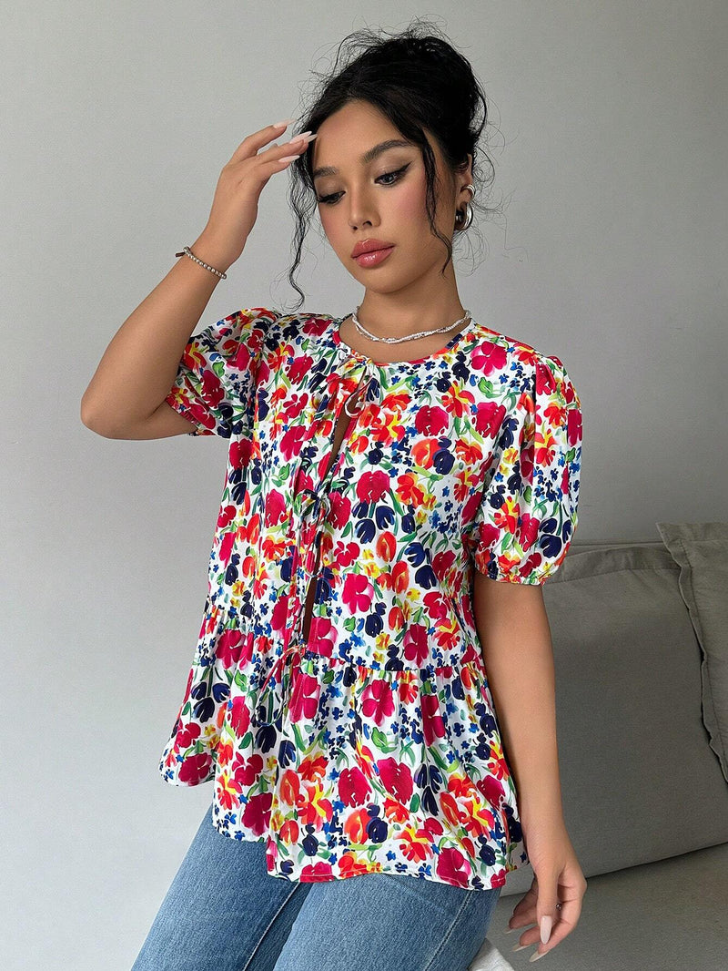 Blusa de manga abullonada con estampado floral y cuello de lazo