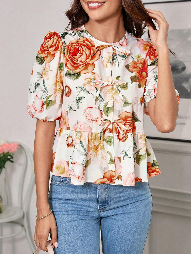 Blusa de cuello redondo con mangas gigot y textura de patron floral de tela