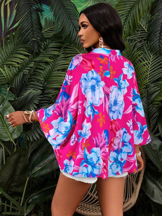 Blusa de manga murcielago con estampado en todas partes con cuello en V cruzado y dobladillo irregular, corto en la parte delantera y largo en la parte trasera (patron aleatorio)