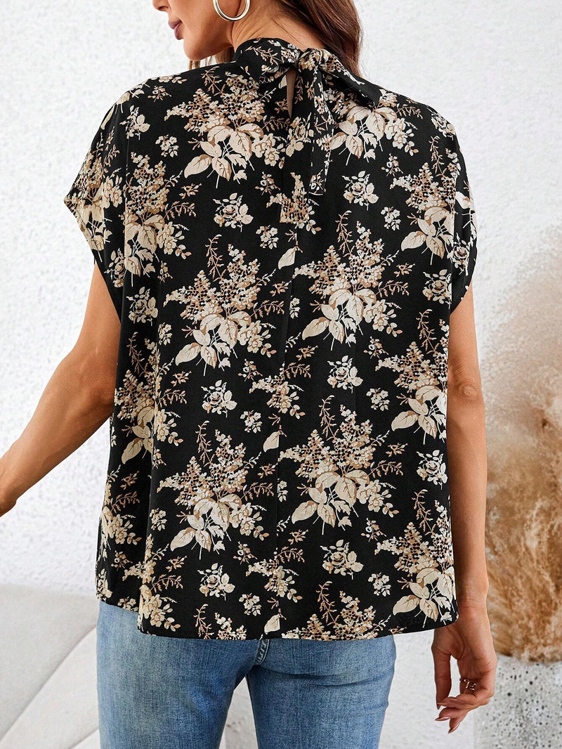 Blusa casual suelta y recta con cuello alto y espalda descubierta con estampado floral para mujer