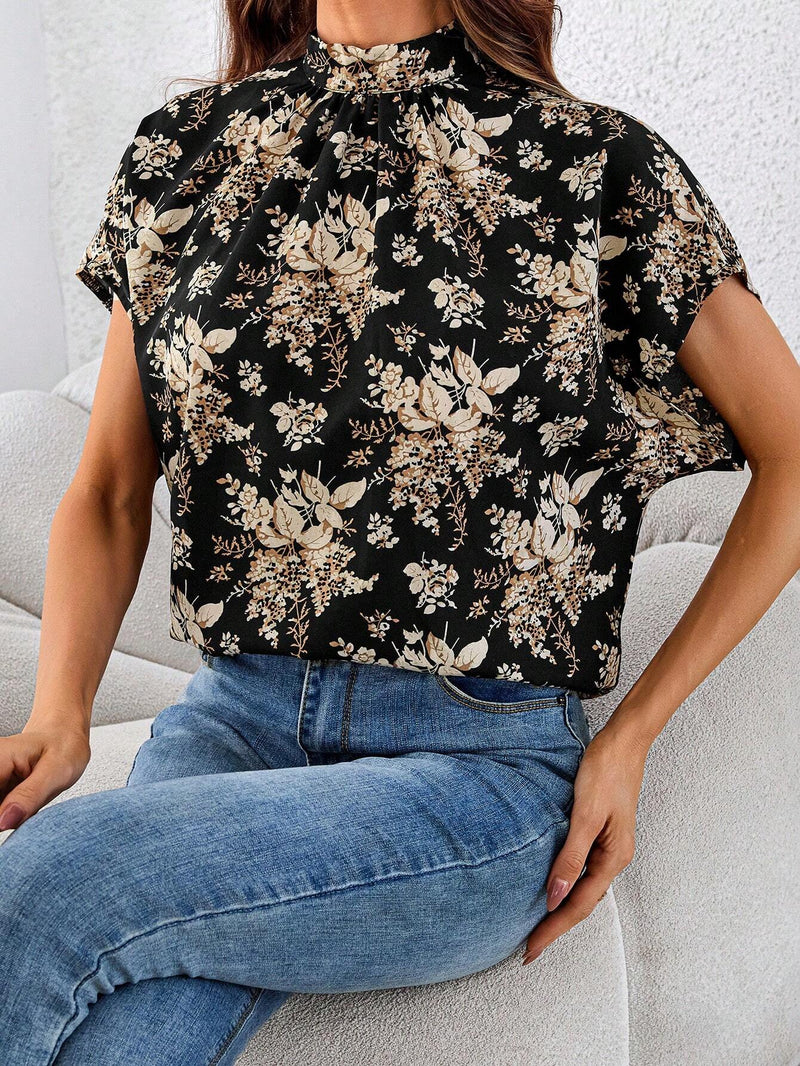 Blusa casual suelta y recta con cuello alto y espalda descubierta con estampado floral para mujer