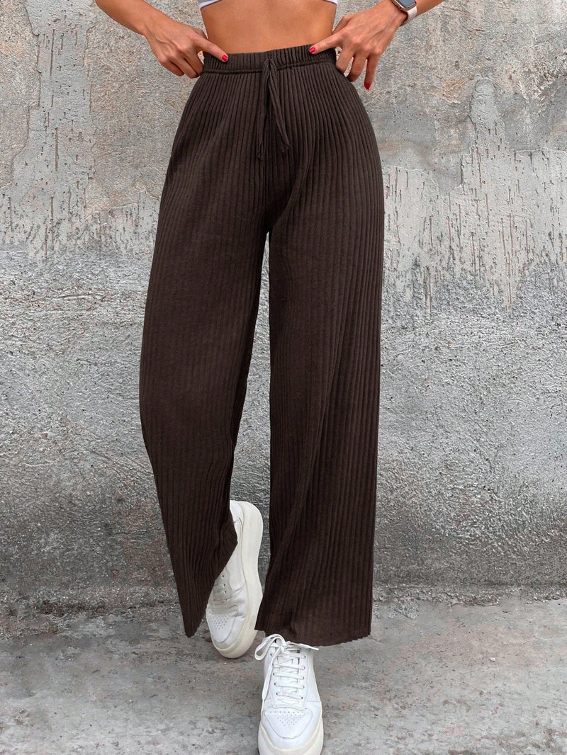 Cottnline pantalones informales minimalistas con nudo delantero de unicolor de algodon