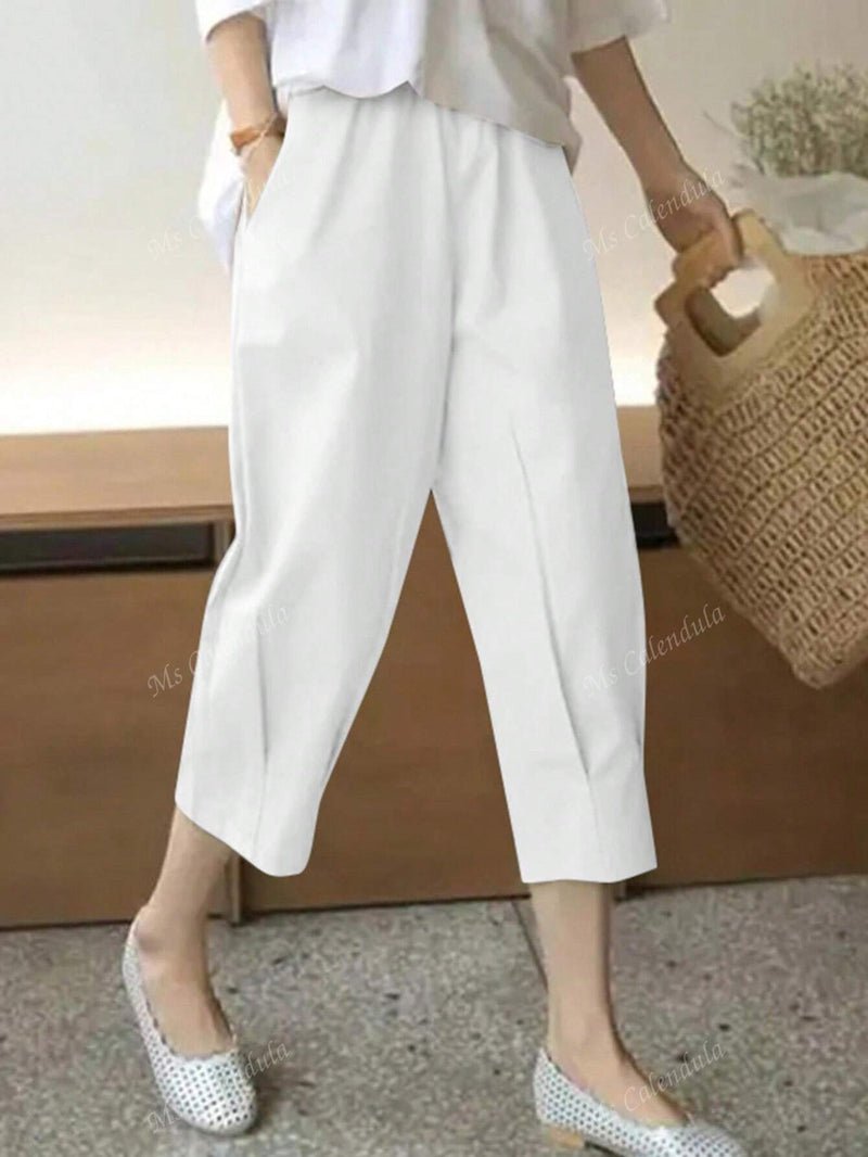 Pantalones cortos blancos de mujer con bolsillos laterales, versatiles y artisticos, de estilo casual