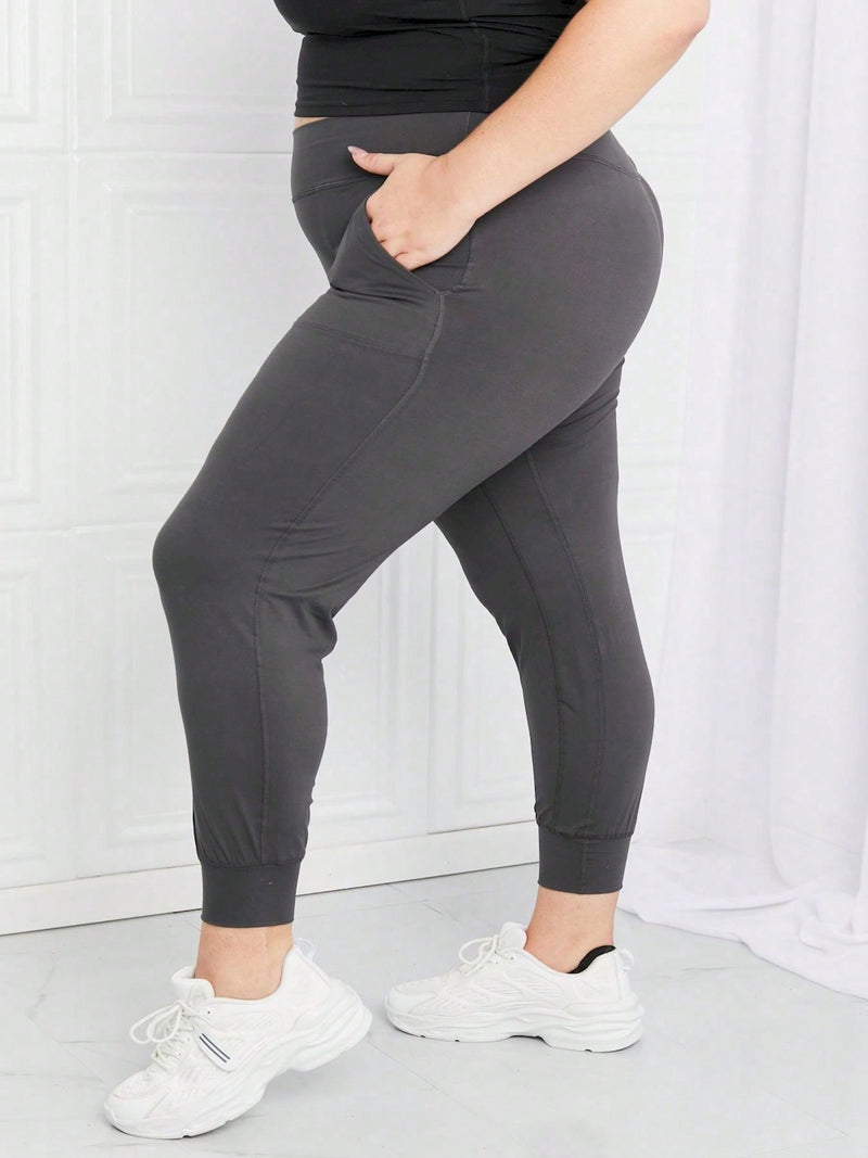 Pantalon casual para mujer, pantalon de chandal de talle alto de color gris carbon, con puno y cintura elastica, cierre de tipo pull-on, ajuste cenido, largo hasta el tobillo, de diseno solido, ideal para actividades deportivas o ropa de estar en casa,