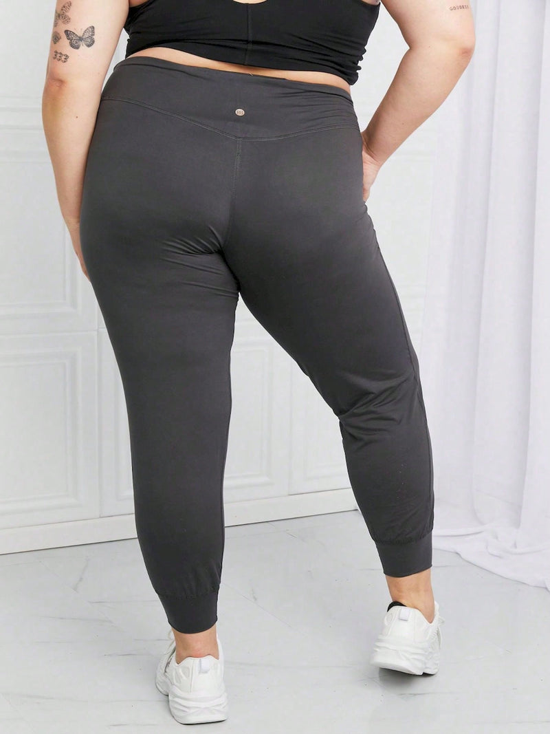 Pantalon casual para mujer, pantalon de chandal de talle alto de color gris carbon, con puno y cintura elastica, cierre de tipo pull-on, ajuste cenido, largo hasta el tobillo, de diseno solido, ideal para actividades deportivas o ropa de estar en casa,