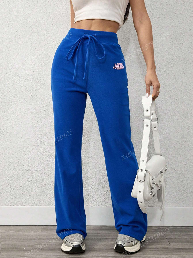 Pantalones joggers casuales con diseno de bolsillo y lazo en la cintura, unicolor, para mujer