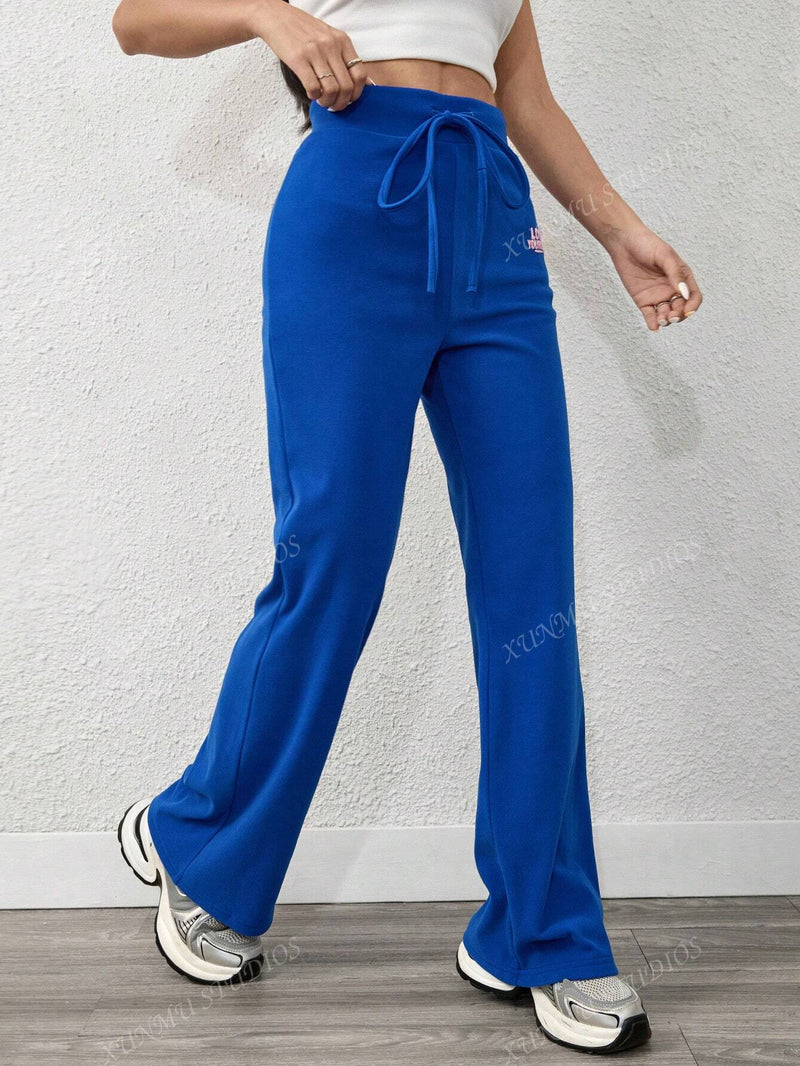 Pantalones joggers casuales con diseno de bolsillo y lazo en la cintura, unicolor, para mujer