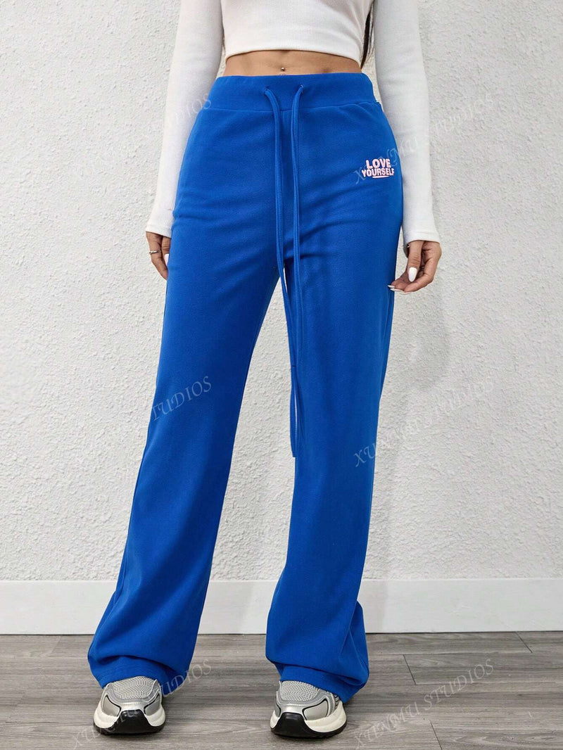 Pantalones joggers casuales con diseno de bolsillo y lazo en la cintura, unicolor, para mujer