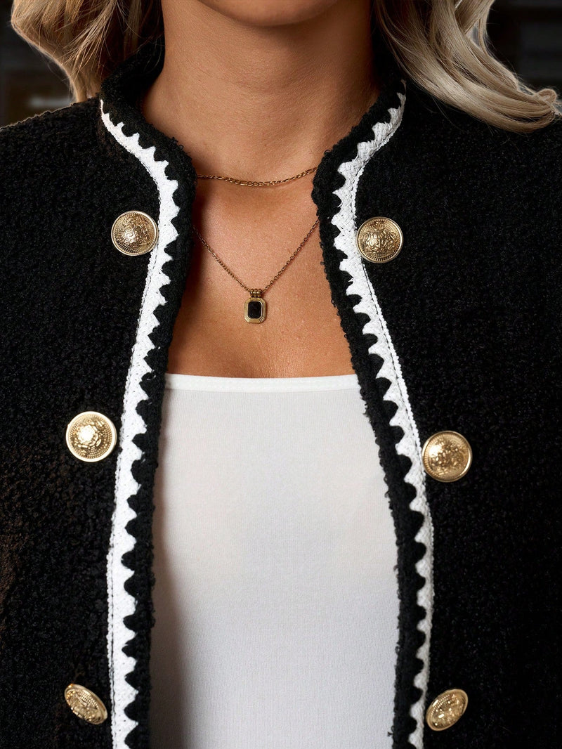 Clasi elegante y chic chaqueta contorneada para mujer con hebilla de metal en blanco y negro