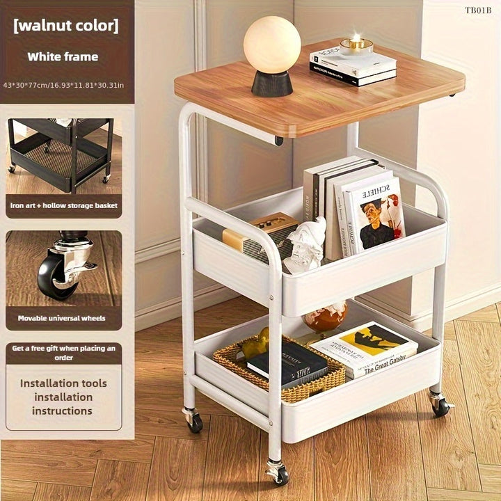 Un carrito de tres niveles con superficie de mesa, herramientas metálicas y estante de almacenamiento para snacks, con un marco de acero al carbono duradero y ruedas portátiles, ideal para uso en casa o en la oficina.
