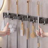 Organizador de pared para escobas y trapeadores, 1 estante metálico con ganchos ajustables, ahorrador de espacio, ideal para baño, cocina, jardín, lavandería o garaje - Acabado lacado, soporte para herramientas y estantes