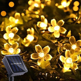Lámpara solar decorativa para exteriores con luces de cerezo, 1 cuerda, material plástico, temática floral, regulable, control con botón, 8 modos de iluminación, panel solar en marco metálico, iluminación para jardín | Luz elegante | Duradera, luces sola