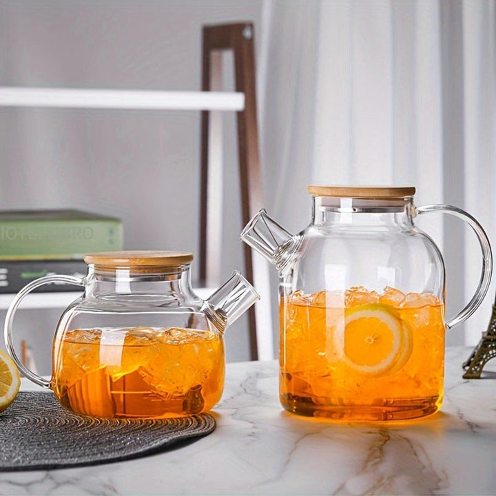 Tetera de vidrio borosilicato con tapa de bambú, 1000ml/1800ml, resistente al calor, jarra de agua de vidrio transparente, pico con filtro removible, apta para estufa y microondas, ideal para té de hojas sueltas y jugo de frutas, regalo perfecto para día