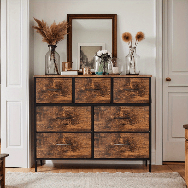 Armario de almacenamiento práctico con cajones y cajas de tela, la superficie superior es flexible