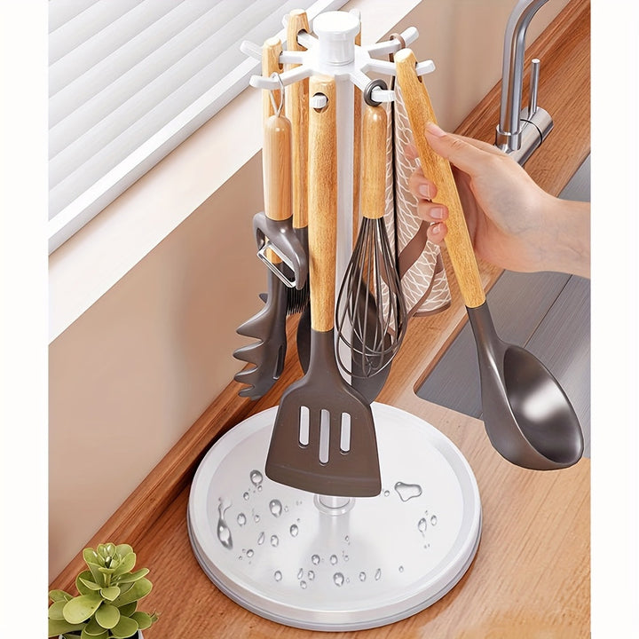 Un estante de almacenamiento de cocina sin necesidad de taladrar, con un gancho y barra giratorios para organizar utensilios como espátulas y cucharas, perfecto para escurrir.