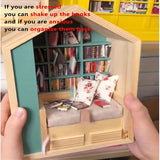 Una caja de mecedora de comodidad artesanal diseñada para aliviar la ansiedad, con una estantería de madera para decoración de oficina en casa, que incluye 200 libros y 2 cojines.